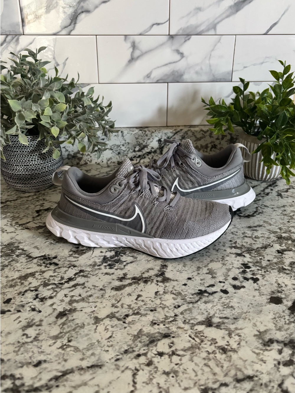 Nike Women's Gray Athletic Running Shoes with White Sole size 8